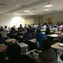 Une salle comble avec plus de 50 participants.